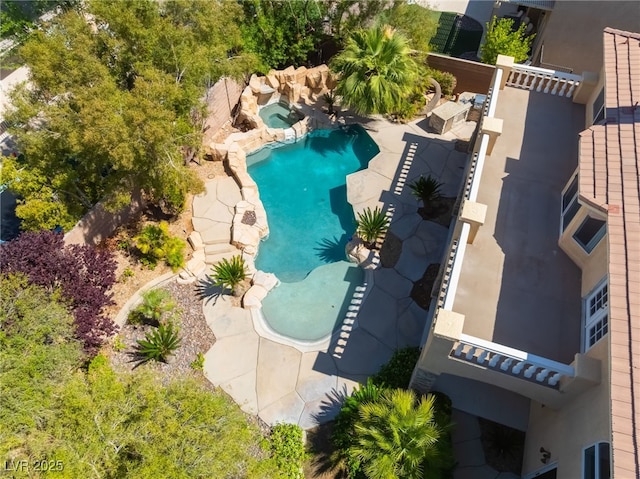 drone / aerial view of a pool area