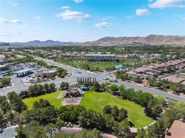 aerial perspective of suburban area featuring a mountainous background