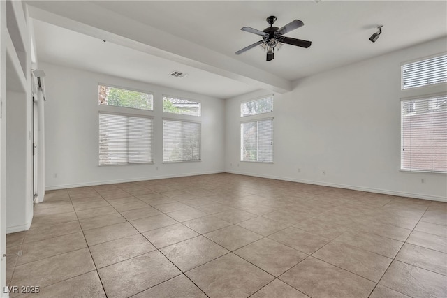 1532 Via Cassia, Henderson, NV 89052 - empty room with light tile patterned floors, plenty of natural light, and a ceiling fan