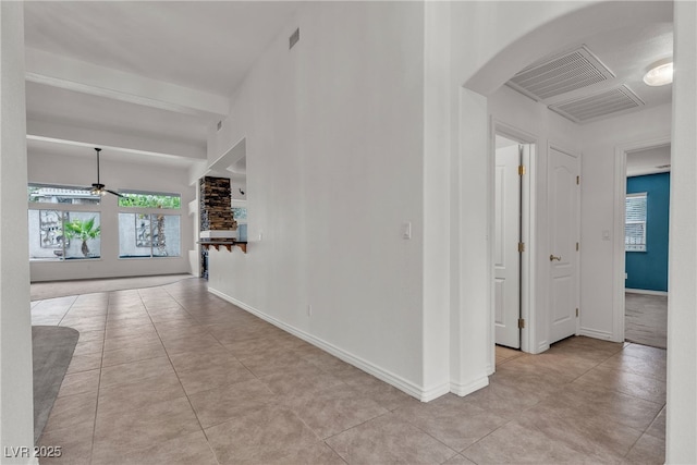 1532 Via Cassia, Henderson, NV 89052 - corridor featuring arched walkways, tile patterned flooring, and baseboards