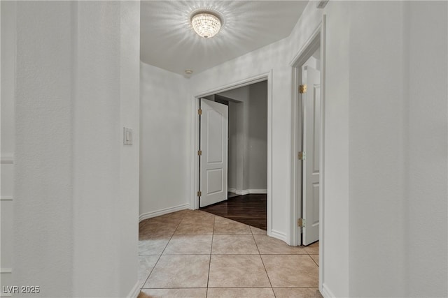 1532 Via Cassia, Henderson, NV 89052 - hallway featuring light tile patterned flooring and baseboards