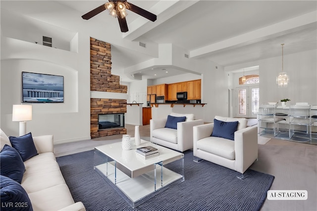 1532 Via Cassia, Henderson, NV 89052 - living area featuring a ceiling fan, beam ceiling, and a fireplace
