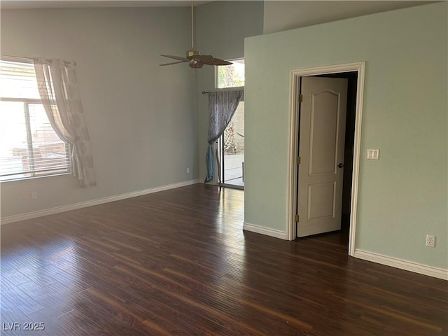 1532 Via Cassia, Henderson, NV 89052 - spare room featuring dark wood-type flooring, a ceiling fan, and baseboards