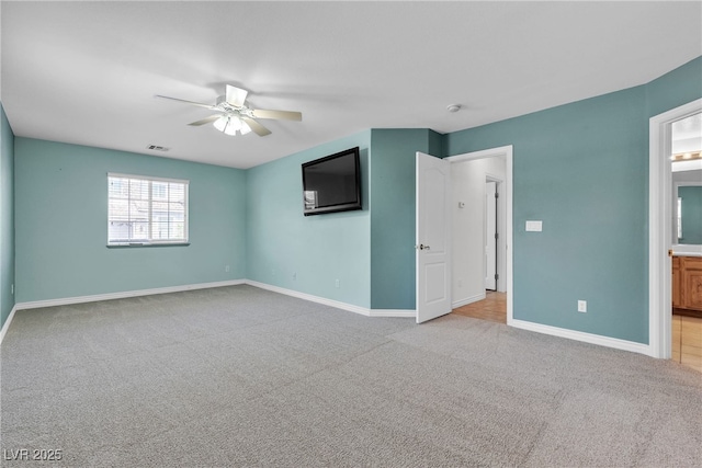 1532 Via Cassia, Henderson, NV 89052 - unfurnished bedroom with light colored carpet, a ceiling fan, and ensuite bathroom