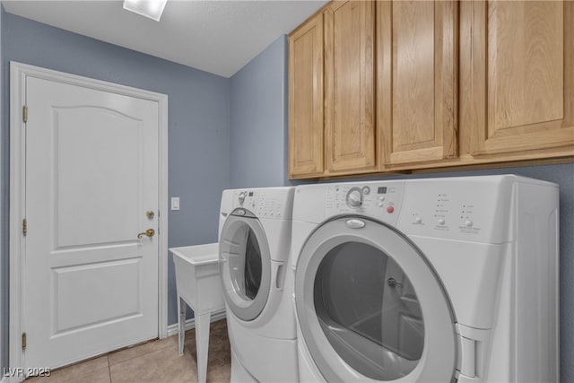 1532 Via Cassia, Henderson, NV 89052 - laundry room with washer and clothes dryer, cabinet space, light tile patterned flooring, and a textured ceiling