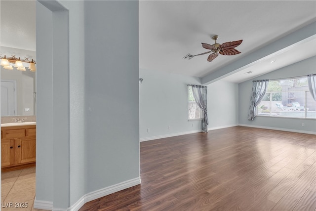 1532 Via Cassia, Henderson, NV 89052 - unfurnished room with vaulted ceiling, ceiling fan, and light wood finished floors