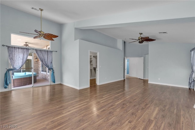 1532 Via Cassia, Henderson, NV 89052 - unfurnished living room featuring a ceiling fan, wood finished floors, and high vaulted ceiling