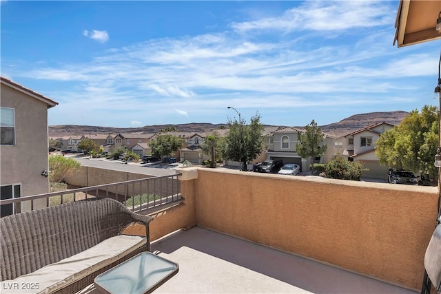 balcony featuring a residential view
