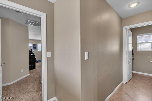corridor with baseboards