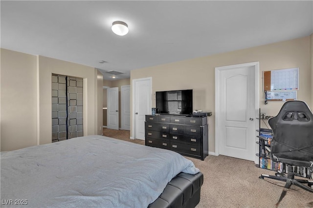 carpeted bedroom with baseboards