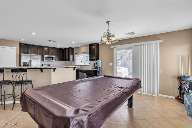 rec room featuring billiards, a chandelier, light tile patterned floors, baseboards, and recessed lighting
