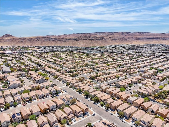 aerial perspective of suburban area featuring a mountain backdrop