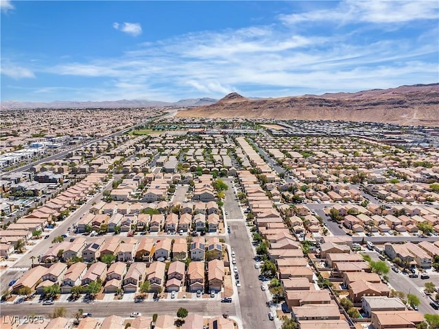 aerial perspective of suburban area with a mountain backdrop