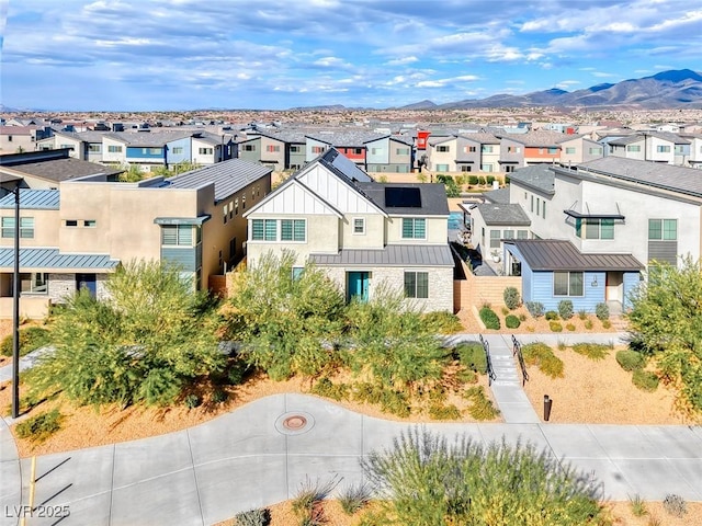 aerial view of residential area with a mountain backdrop