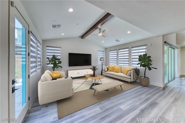 living area with wood finished floors, ceiling fan, baseboards, and recessed lighting