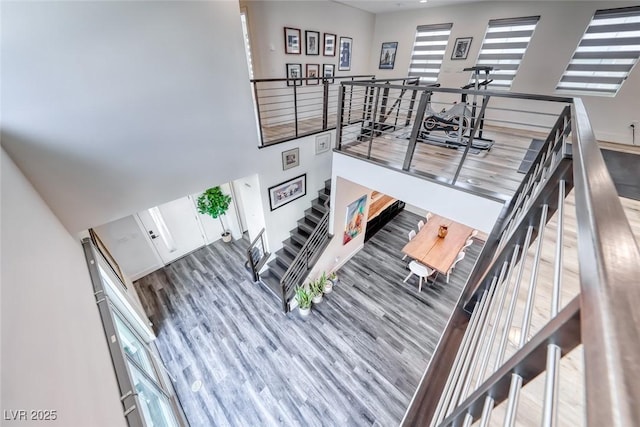 stairway with wood finished floors