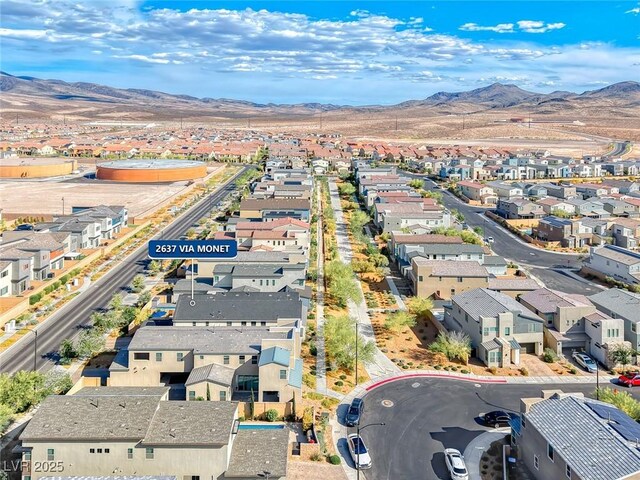 aerial view of residential area with mountains