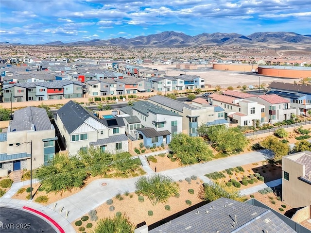 aerial view of residential area with a mountain backdrop