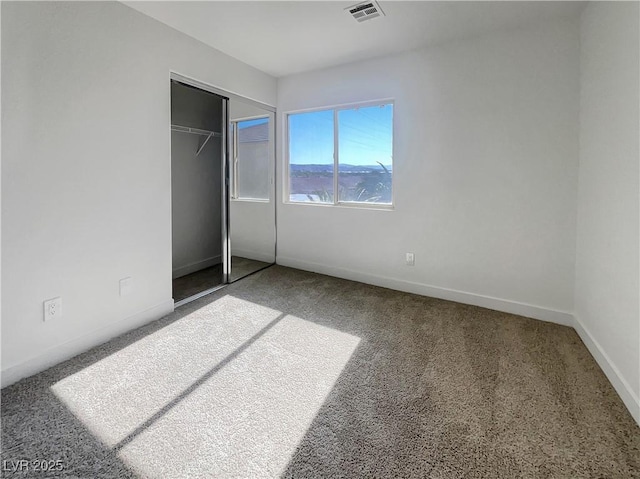 983 Plantain Lily Ave, Las Vegas, NV 89183 - unfurnished bedroom featuring carpet floors, baseboards, and a closet