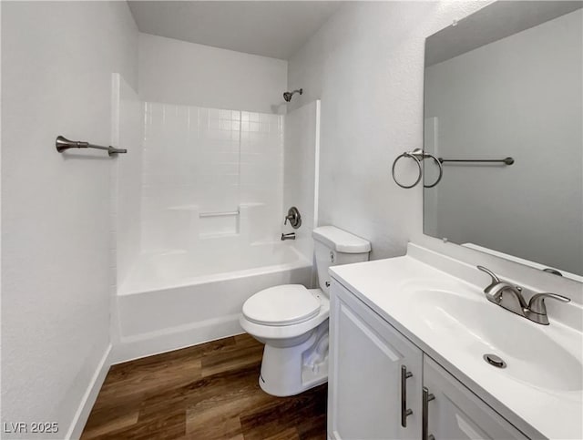 983 Plantain Lily Ave, Las Vegas, NV 89183 - bathroom featuring wood finished floors, toilet, vanity, and shower / washtub combination