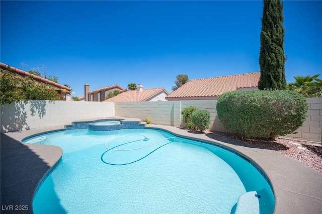 1620 Western Lily St, Las Vegas, NV 89128 - view of swimming pool featuring a fenced backyard and a pool with connected hot tub
