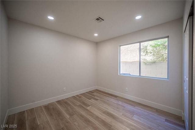 1620 Western Lily St, Las Vegas, NV 89128 - unfurnished room featuring light wood finished floors, recessed lighting, and baseboards