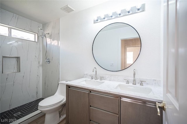 1620 Western Lily St, Las Vegas, NV 89128 - full bath featuring toilet, double vanity, and a marble finish shower