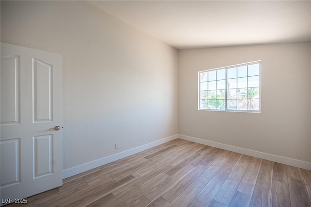 1620 Western Lily St, Las Vegas, NV 89128 - spare room with wood finished floors and baseboards