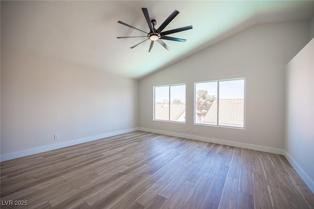1620 Western Lily St, Las Vegas, NV 89128 - unfurnished room with vaulted ceiling, a ceiling fan, wood finished floors, and baseboards