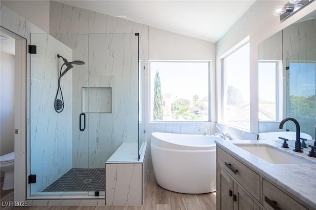 1620 Western Lily St, Las Vegas, NV 89128 - bathroom featuring lofted ceiling, a marble finish shower, a bathtub, wood finished floors, and toilet