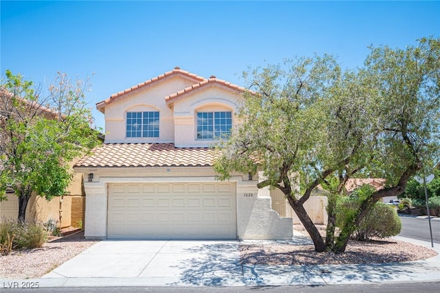 1620 Western Lily St, Las Vegas, NV 89128 - mediterranean / spanish home with a tile roof, concrete driveway, stucco siding, and a garage