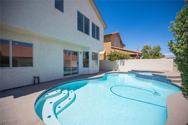 1620 Western Lily St, Las Vegas, NV 89128 - view of pool with a pool with connected hot tub, fence, and a patio area