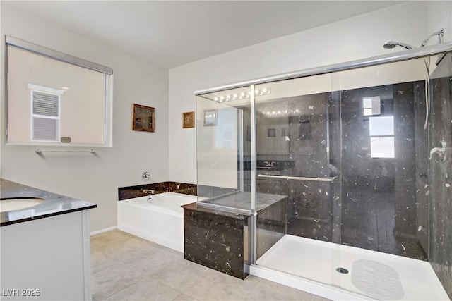748 Dellenbaugh Ct, Las Vegas, NV 89178 - full bath featuring a shower stall, tile patterned flooring, a garden tub, vanity, and baseboards