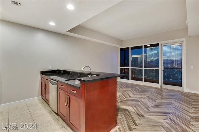 4575 Dean Martin Dr Unit 2701, Las Vegas, NV 89103 - kitchen featuring dishwasher, a sink, baseboards, recessed lighting, and a peninsula