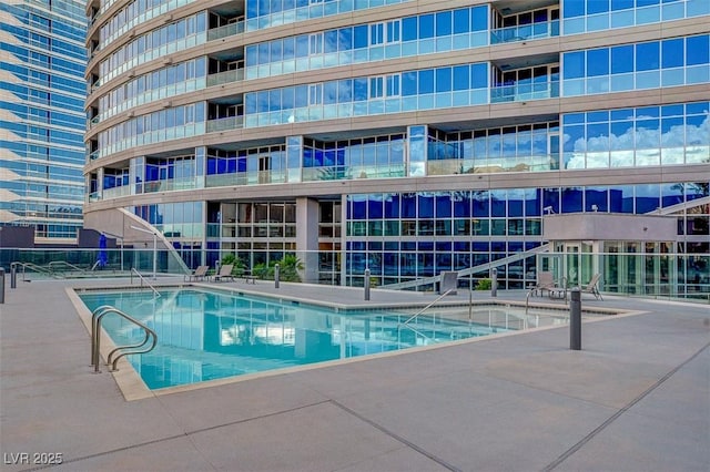 4575 Dean Martin Dr Unit 2701, Las Vegas, NV 89103 - community pool featuring a patio area