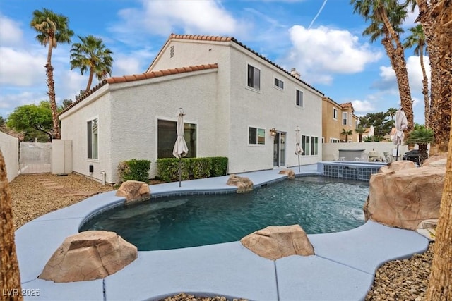 2024 Spruce Brook Dr, Henderson, NV 89074 - view of pool with a fenced backyard, an in-ground hot tub, and a patio