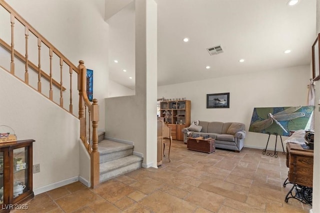 2024 Spruce Brook Dr, Henderson, NV 89074 - living room with stone tile floors, stairway, recessed lighting, and baseboards