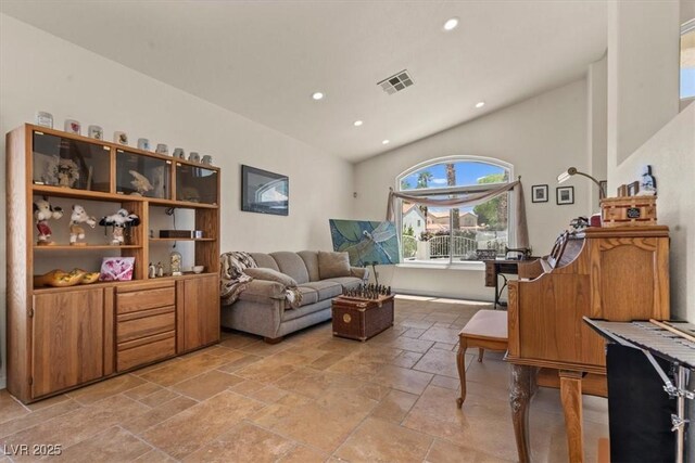 2024 Spruce Brook Dr, Henderson, NV 89074 - sitting room with stone tile floors, recessed lighting, and high vaulted ceiling