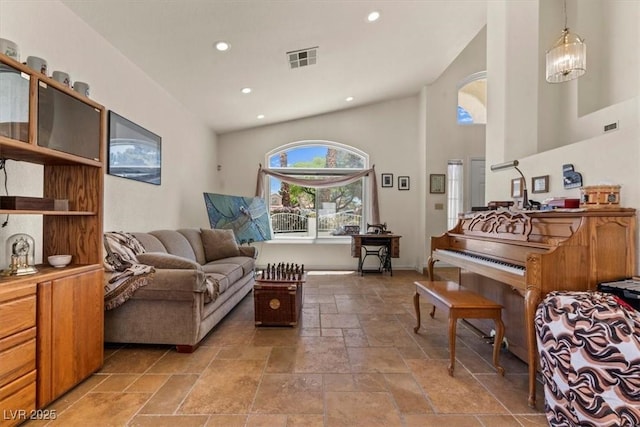 2024 Spruce Brook Dr, Henderson, NV 89074 - sitting room with stone tile flooring, recessed lighting, a high ceiling, and baseboards