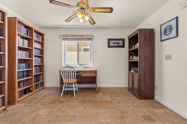 2024 Spruce Brook Dr, Henderson, NV 89074 - office area with baseboards, ceiling fan, and stone tile floors