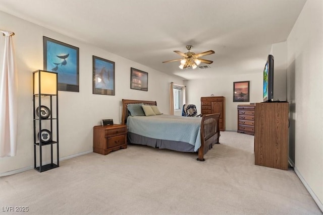 2024 Spruce Brook Dr, Henderson, NV 89074 - bedroom featuring light carpet, ceiling fan, and baseboards