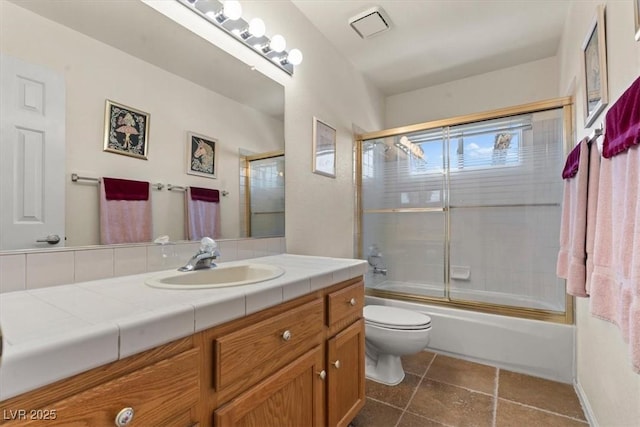 2024 Spruce Brook Dr, Henderson, NV 89074 - full bath featuring toilet, vanity, and enclosed tub / shower combo