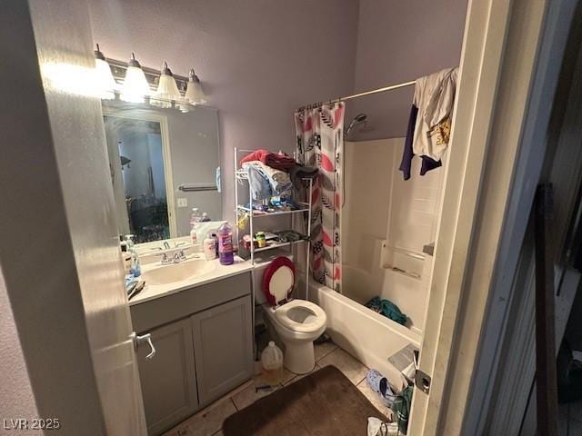 full bathroom featuring tile patterned floors, toilet, vanity, and shower / tub combo