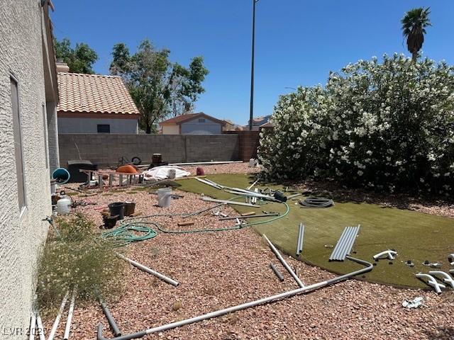 view of yard featuring fence