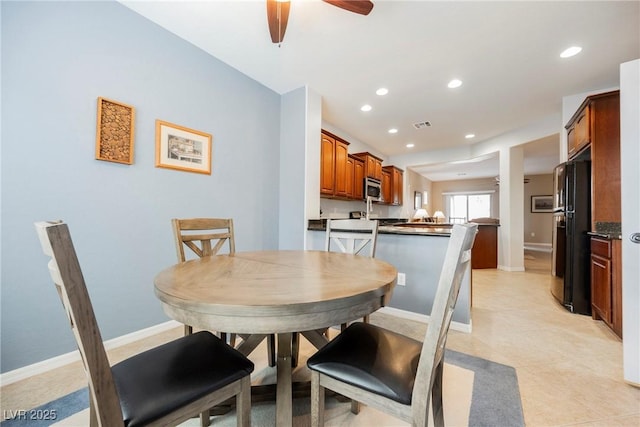 dining space featuring recessed lighting, a ceiling fan, and baseboards