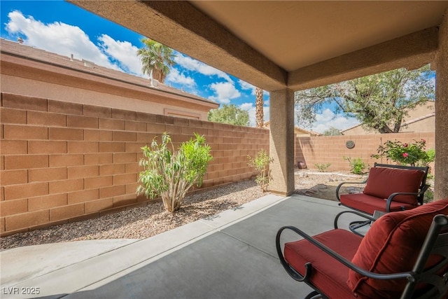 view of patio with a fenced backyard