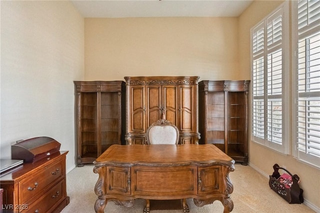 6224 Red Pine Ct, Las Vegas, NV 89130 - home office featuring light colored carpet, healthy amount of natural light, and baseboards