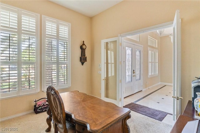 6224 Red Pine Ct, Las Vegas, NV 89130 - office area with healthy amount of natural light, french doors, and baseboards