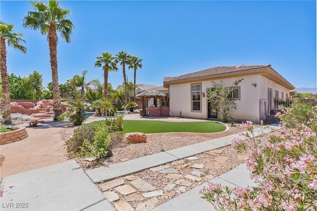 6224 Red Pine Ct, Las Vegas, NV 89130 - view of green lawn with a patio