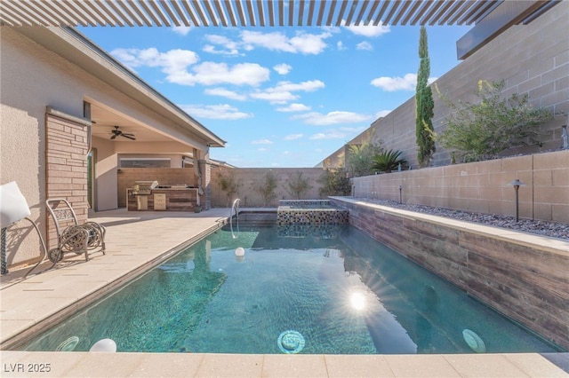 view of pool with area for grilling, a fenced backyard, a patio, ceiling fan, and a pool with connected hot tub